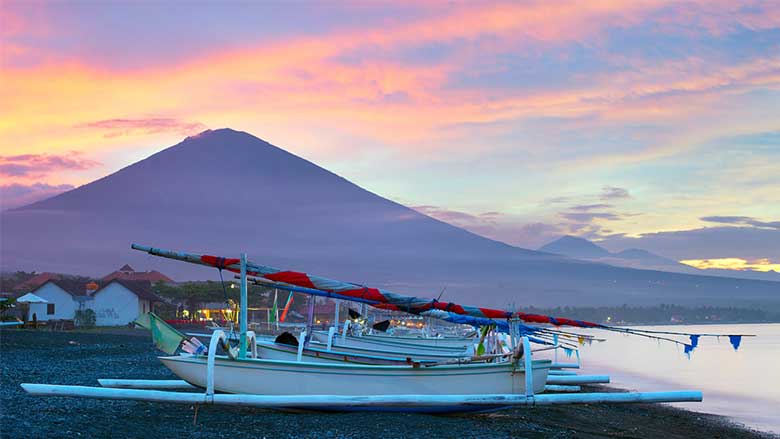 See Agung volcano, the highest point on the island
